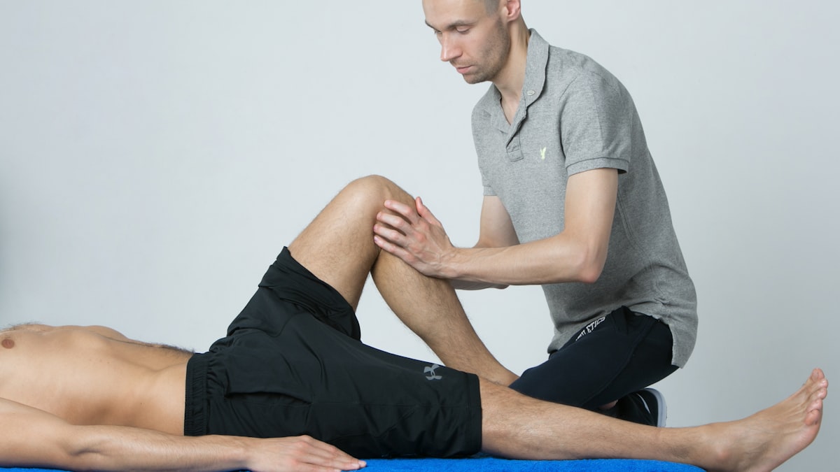 Baker's cyst treatment without surgery: a doctor examining a patient's knee at Regenerative Joint Clinics in Riverdale, GA